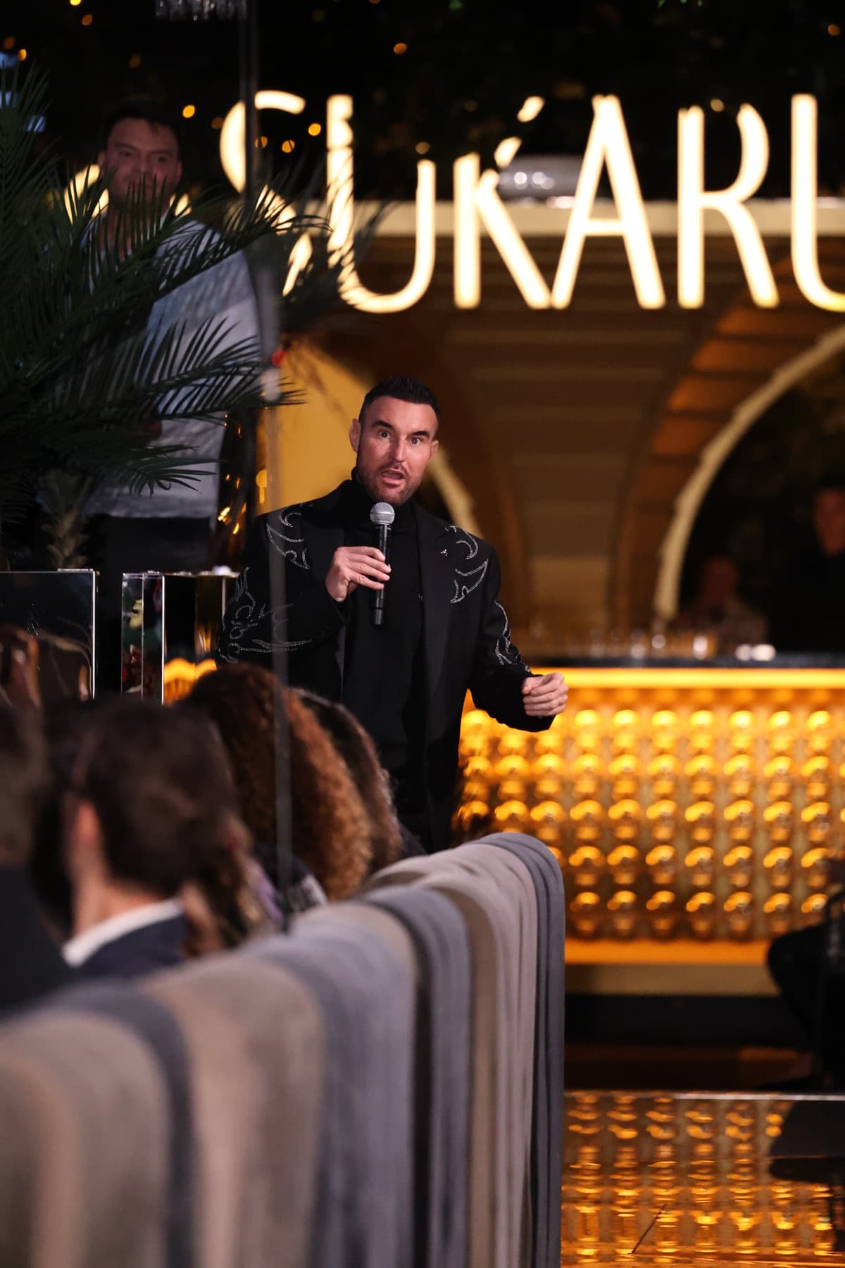 Philipp Plein opening the Spring Summer 26 show at the microphone