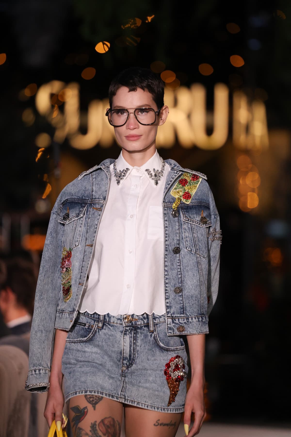 Ice cream graphic varsity jacket on the runway
