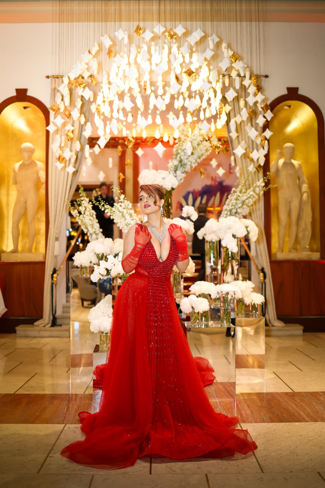 Red couture gown at a Cannes 2026 evening event