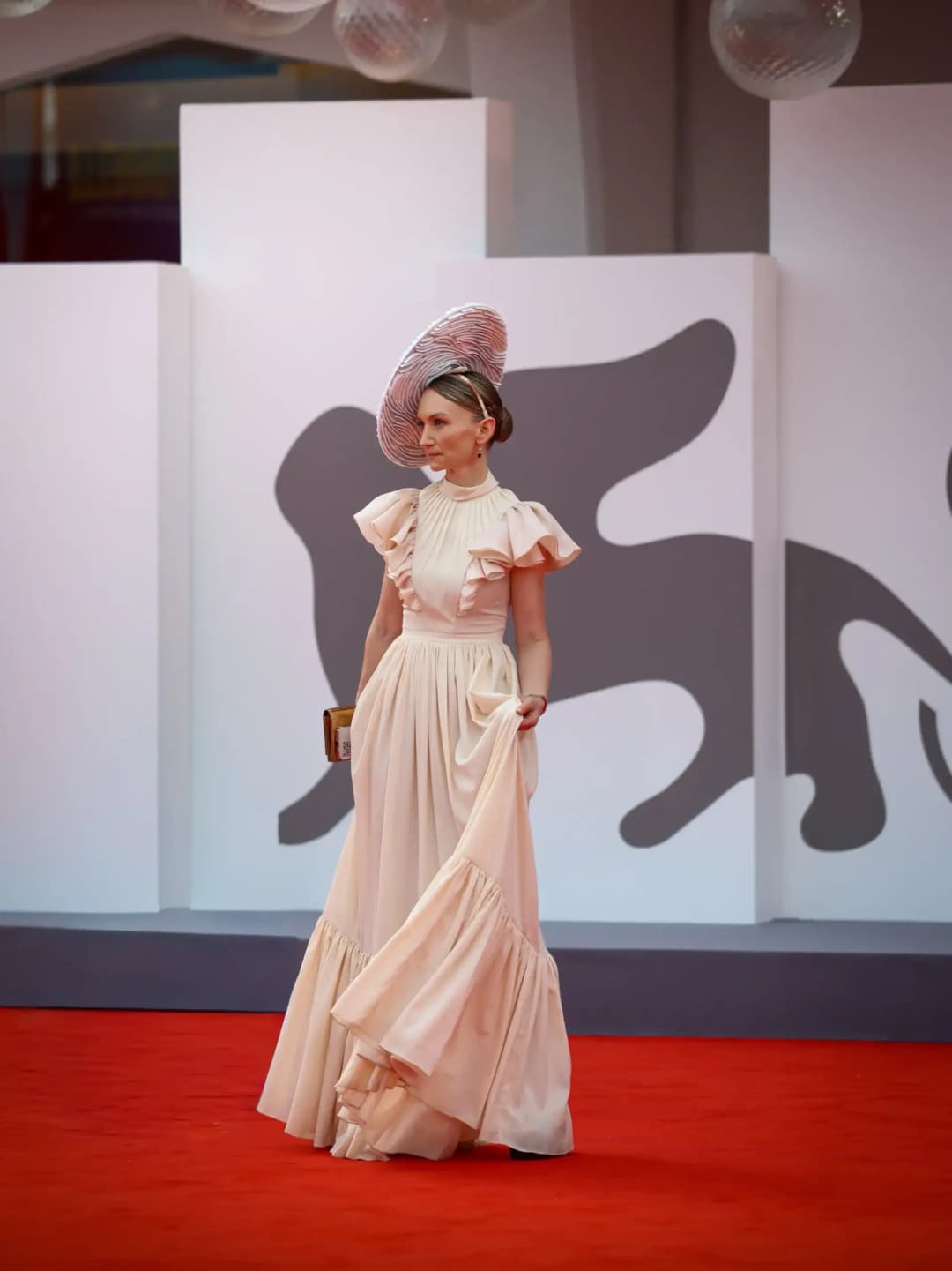 Vitalina Ghinzelli at Venice 82: The Art of Hats Conquers the Red Carpet